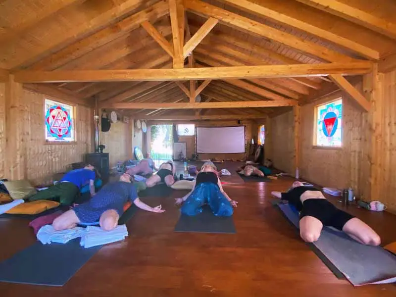 10 best yoga retreats in Europe 10 best yoga retreats in Europe picture of the practice space with gusts in it.
